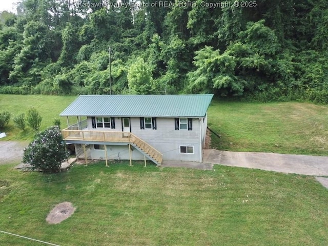 61 Sol Ln, Charleston, WV 25312 - view of front of house featuring stairway, a metal roof, and a front lawn