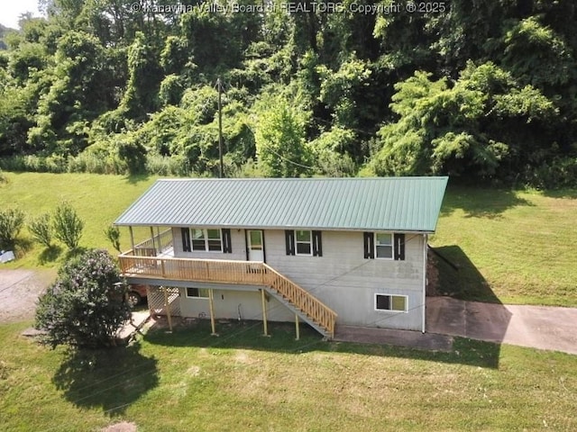 61 Sol Ln, Charleston, WV 25312 - rear view of house with stairway, a yard, and a metal roof