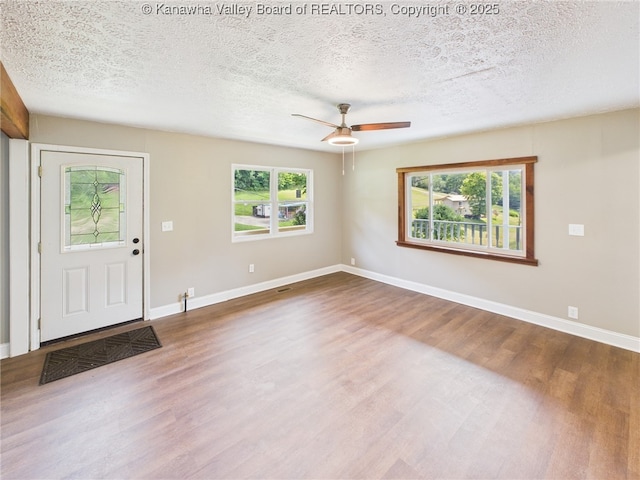 61 Sol Ln, Charleston, WV 25312 - foyer with wood finished floors, a textured ceiling, and ceiling fan