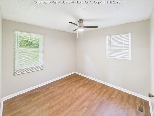 61 Sol Ln, Charleston, WV 25312 - spare room featuring wood finished floors and ceiling fan