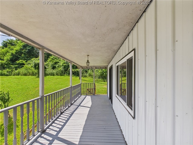 61 Sol Ln, Charleston, WV 25312 - wooden porch with a lawn