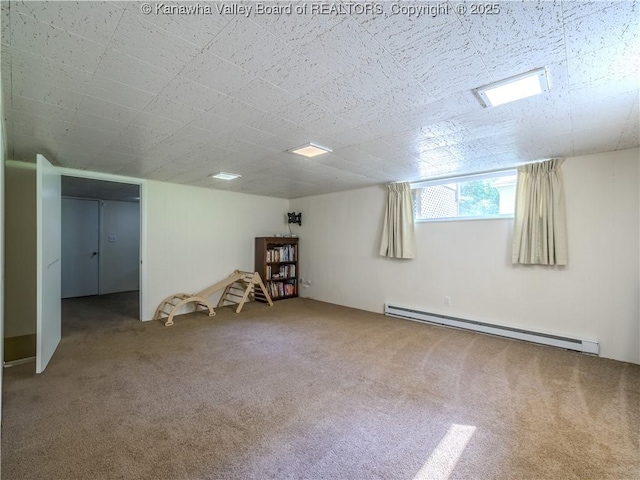 806 Whispering Way S, Charleston, WV 25303 - basement featuring a baseboard heating unit and carpet flooring