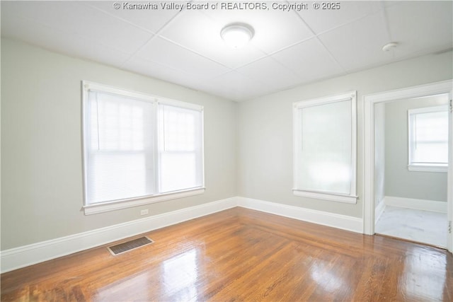 512 Maxwell St, Charleston, WV 25311 - spare room with wood finished floors and a drop ceiling