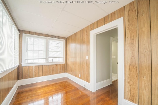 512 Maxwell St, Charleston, WV 25311 - unfurnished room with wood finished floors, plenty of natural light, and wood walls