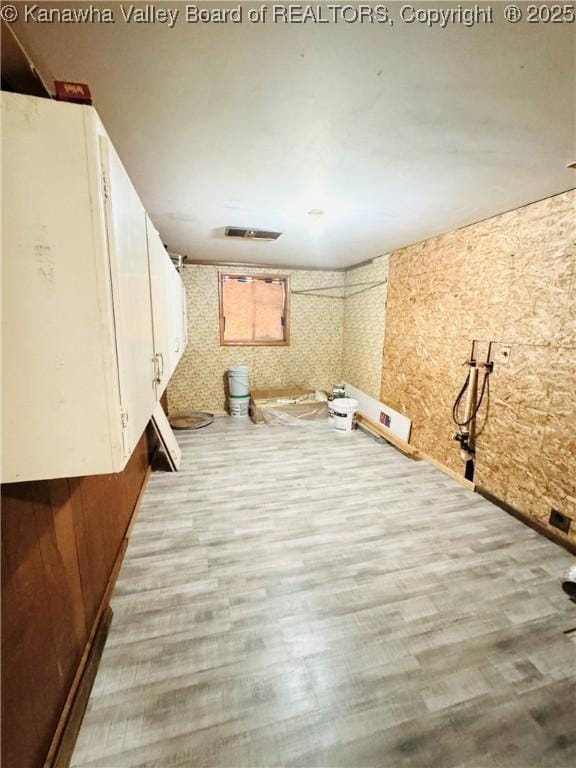 8612 Maryland Ave, Marmet, WV 25315 - empty room with wood finished floors