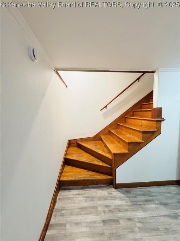 8612 Maryland Ave, Marmet, WV 25315 - staircase featuring wood finished floors and baseboards