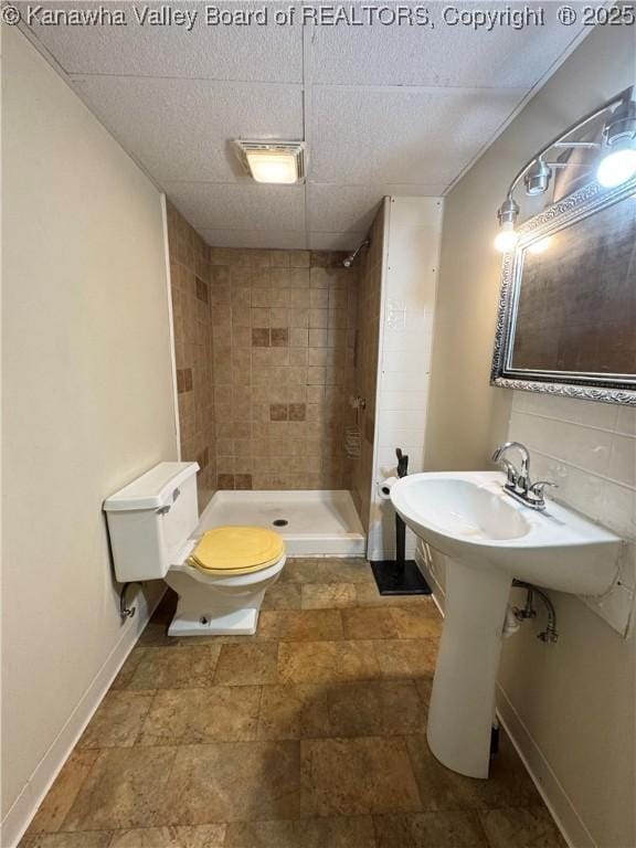 8612 Maryland Ave, Marmet, WV 25315 - bathroom featuring a shower stall and stone finish flooring
