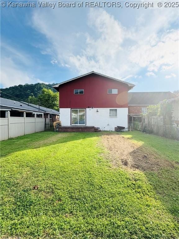 8612 Maryland Ave, Marmet, WV 25315 - rear view of property featuring stucco siding