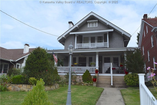 810 Maple Rd, Charleston, WV 25302 - view of front of property with a porch, a front lawn, and a balcony