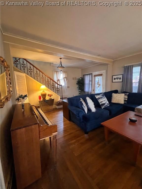 810 Maple Rd, Charleston, WV 25302 - living room with wood finished floors, stairs, and ornamental molding