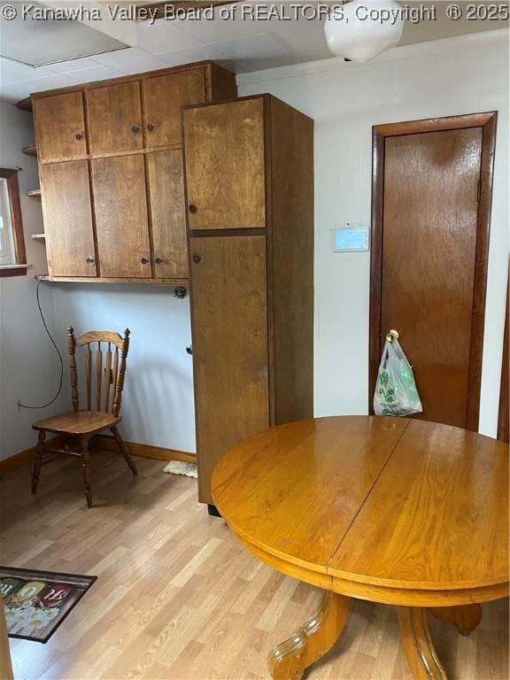 510 S Railway St, Cedar Grove, WV 25039 - dining space with light wood-style floors and baseboards