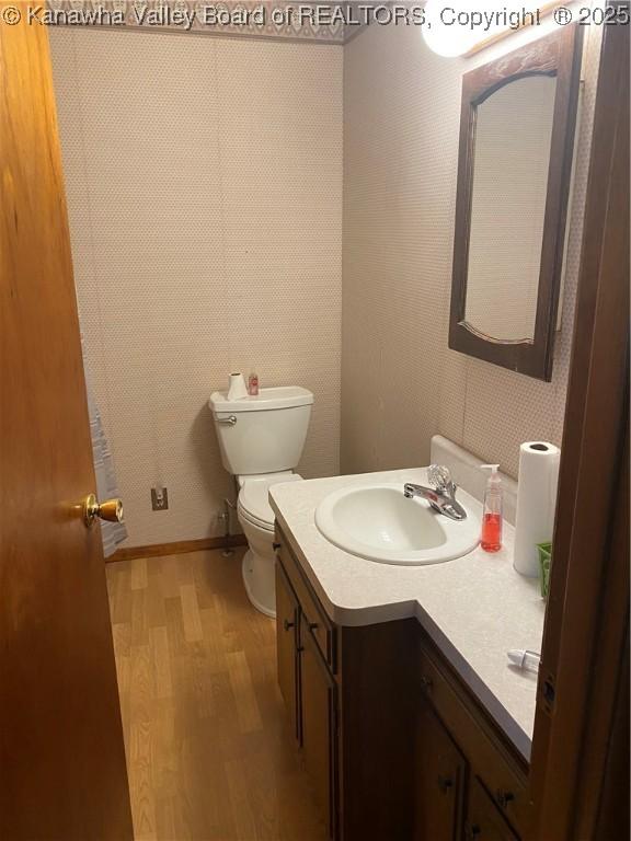 510 S Railway St, Cedar Grove, WV 25039 - bathroom featuring vanity and wood finished floors