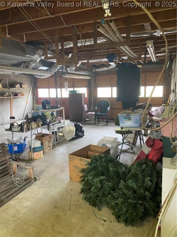 510 S Railway St, Cedar Grove, WV 25039 - miscellaneous room featuring unfinished concrete flooring and healthy amount of natural light