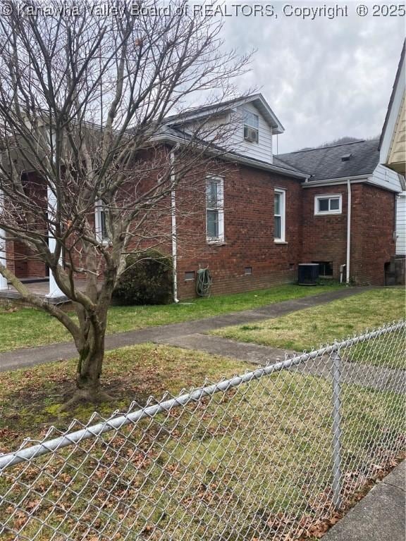 510 S Railway St, Cedar Grove, WV 25039 - view of property exterior with brick siding and crawl space