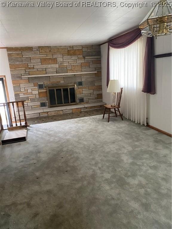 510 S Railway St, Cedar Grove, WV 25039 - unfurnished living room with a stone fireplace and carpet floors