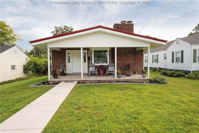 1204 Highland Dr, Saint Albans, WV 25177 - bungalow featuring brick siding, a porch, a chimney, and a front yard