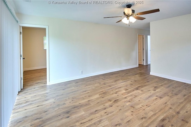 4013 Seymour Ln, Charleston, WV 25313 - empty room with a ceiling fan and wood finished floors