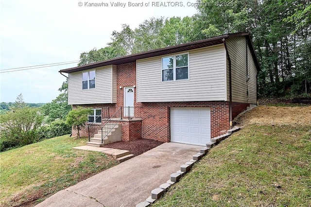 4013 Seymour Ln, Charleston, WV 25313 - bi-level home with a garage, driveway, a front lawn, and brick siding