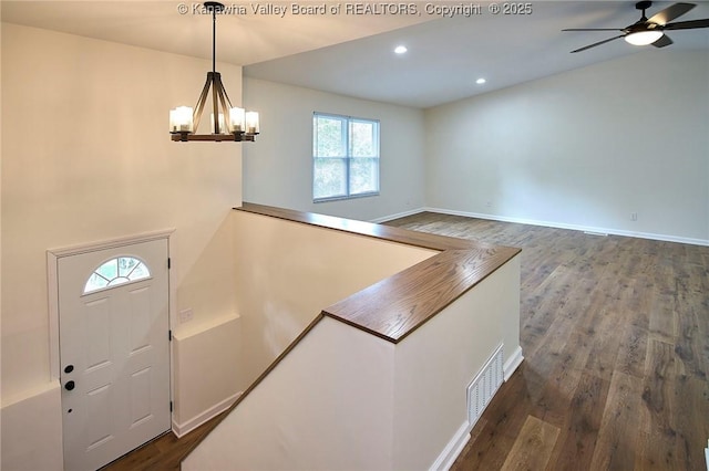 4013 Seymour Ln, Charleston, WV 25313 - foyer with dark wood-style floors, a ceiling fan, a chandelier, and recessed lighting