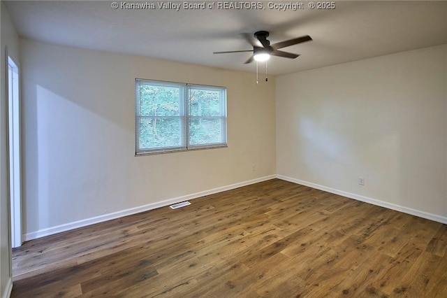 4013 Seymour Ln, Charleston, WV 25313 - unfurnished room with a ceiling fan and dark wood-style flooring