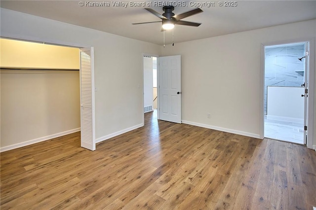 4013 Seymour Ln, Charleston, WV 25313 - unfurnished bedroom featuring wood finished floors, a closet, and a ceiling fan