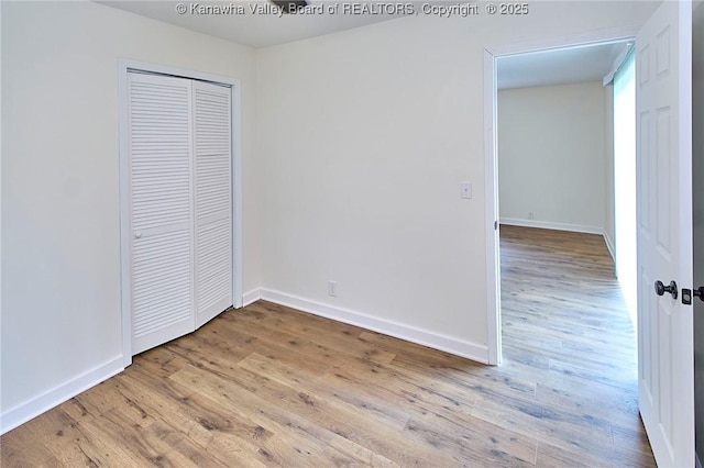 4013 Seymour Ln, Charleston, WV 25313 - unfurnished bedroom featuring wood finished floors and a closet