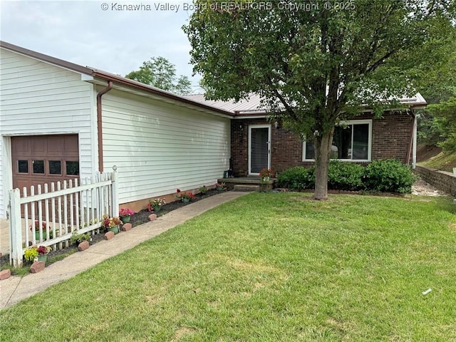 5005 Buffy Dr, Cross Lanes, WV 25313 - ranch-style home with a garage and brick siding