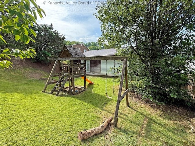 5005 Buffy Dr, Cross Lanes, WV 25313 - view of green lawn with a playground