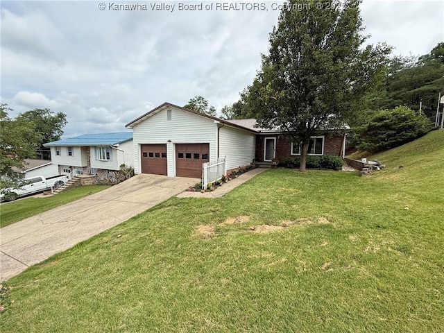 5005 Buffy Dr, Cross Lanes, WV 25313 - single story home with an attached garage, a front yard, and concrete driveway
