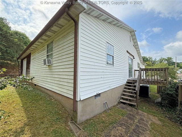 5005 Buffy Dr, Cross Lanes, WV 25313 - view of home's exterior featuring crawl space, stairway, and a wooden deck