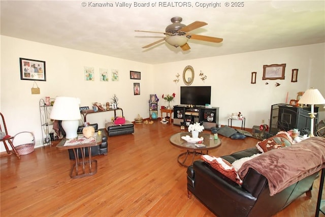 5005 Buffy Dr, Cross Lanes, WV 25313 - living room featuring a ceiling fan and wood finished floors