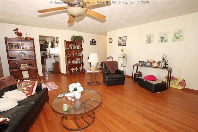 5005 Buffy Dr, Cross Lanes, WV 25313 - living room featuring wood finished floors and a ceiling fan