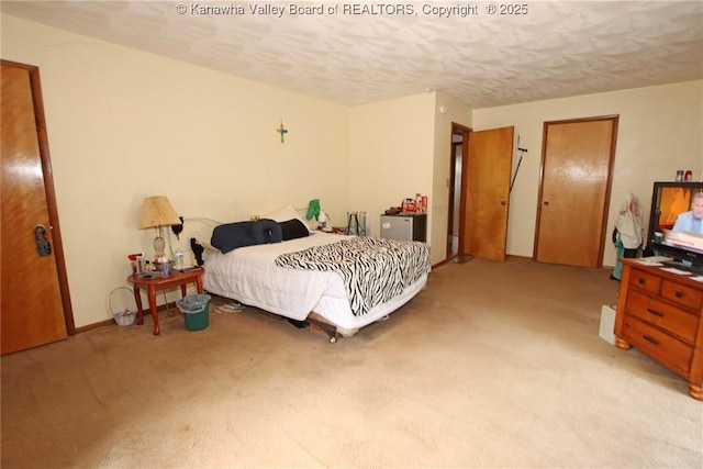 5005 Buffy Dr, Cross Lanes, WV 25313 - bedroom featuring light carpet and a textured ceiling