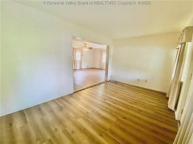 391 River Rd, Racine, WV 25165 - unfurnished room featuring light wood-type flooring and a ceiling fan