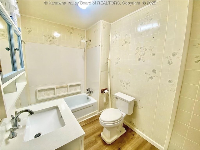 391 River Rd, Racine, WV 25165 - full bath with wood finished floors, shower / washtub combination, and vanity