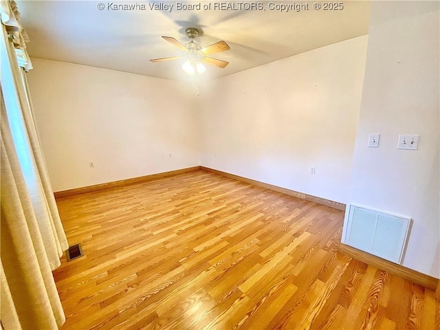 391 River Rd, Racine, WV 25165 - empty room featuring light wood-type flooring and a ceiling fan
