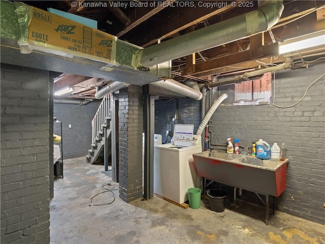 5 Manor Pl, Charleston, WV 25311 - basement with stairs, washer and clothes dryer, and brick wall