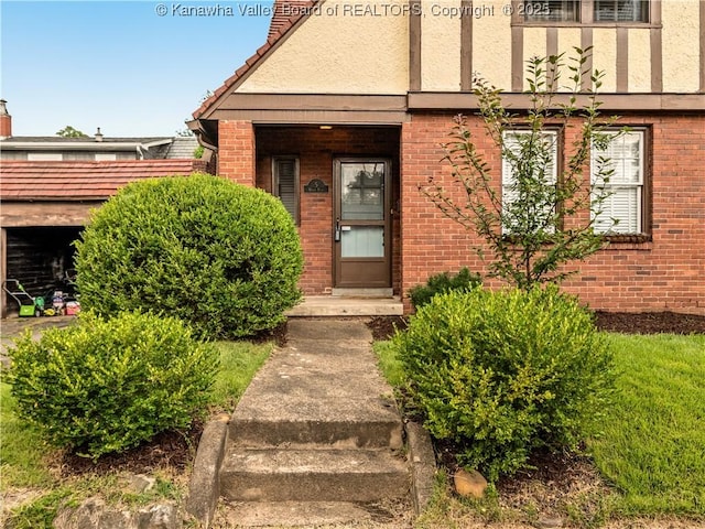 5 Manor Pl, Charleston, WV 25311 - view of exterior entry with brick siding and stucco siding
