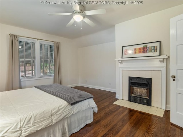 5 Manor Pl, Charleston, WV 25311 - bedroom featuring wood finished floors, a ceiling fan, and a tile fireplace