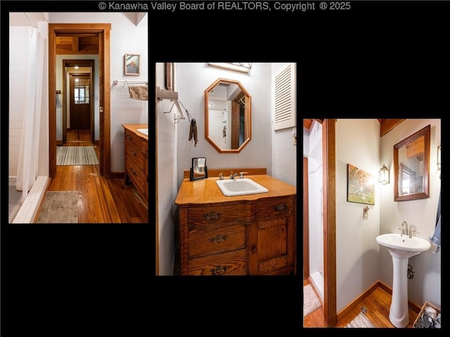 114 Shady Ln, Winfield, WV 25213 - bathroom featuring wood finished floors and two sinks