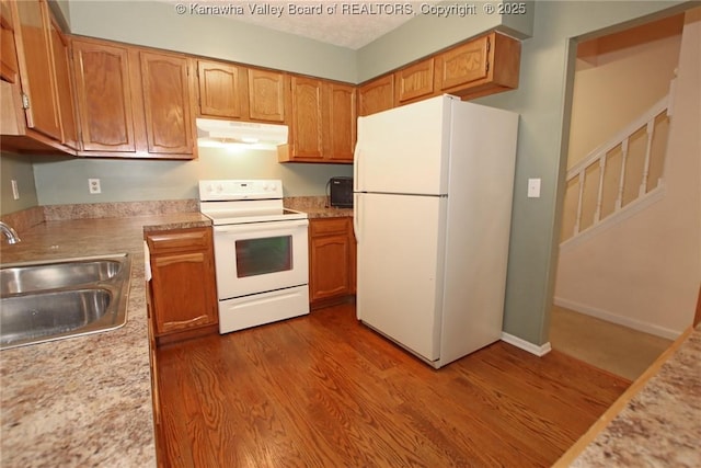 1302 Hunters Ridge Rd, Charleston, WV 25314 - kitchen featuring white appliances, under cabinet range hood, and light countertops