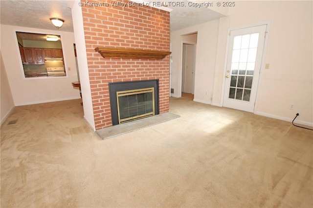 1302 Hunters Ridge Rd, Charleston, WV 25314 - unfurnished living room featuring carpet flooring, a brick fireplace, and a textured ceiling