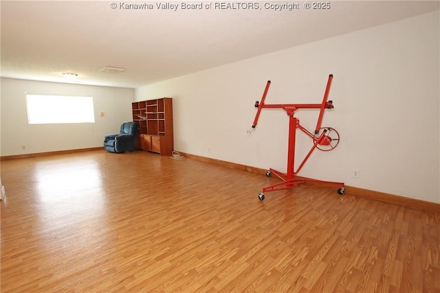 1302 Hunters Ridge Rd, Charleston, WV 25314 - spare room with light wood-style floors and baseboards