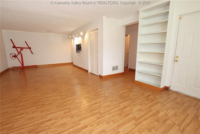 1302 Hunters Ridge Rd, Charleston, WV 25314 - spare room with light wood-style flooring and baseboards
