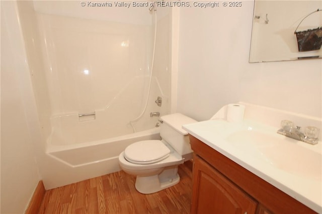 1302 Hunters Ridge Rd, Charleston, WV 25314 - bathroom featuring wood finished floors, vanity, and tub / shower combination