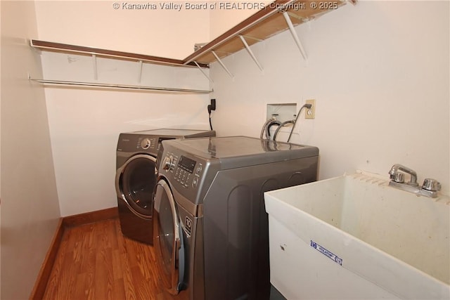 1302 Hunters Ridge Rd, Charleston, WV 25314 - laundry area with washing machine and dryer and wood finished floors
