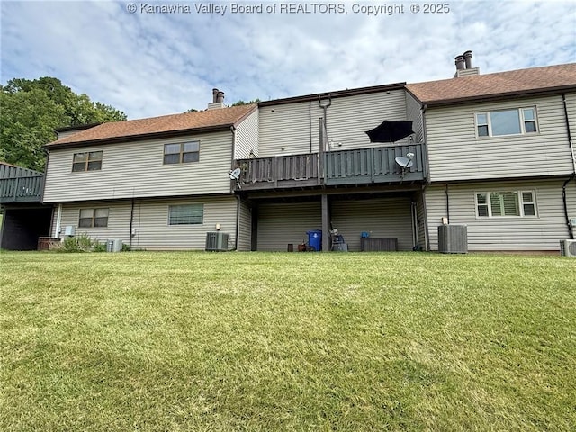 1302 Hunters Ridge Rd, Charleston, WV 25314 - rear view of house with a deck and a lawn