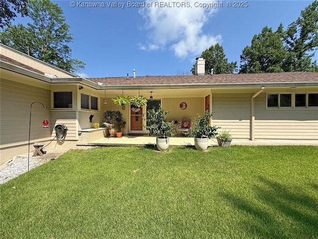 1500 Longridge Rd, Charleston, WV 25314 - rear view of house with a lawn and a chimney