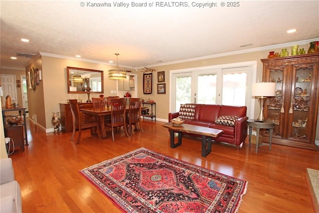 1500 Longridge Rd, Charleston, WV 25314 - living area with wood finished floors, ornamental molding, and recessed lighting