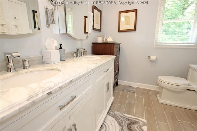 1500 Longridge Rd, Charleston, WV 25314 - bathroom with double vanity and baseboards